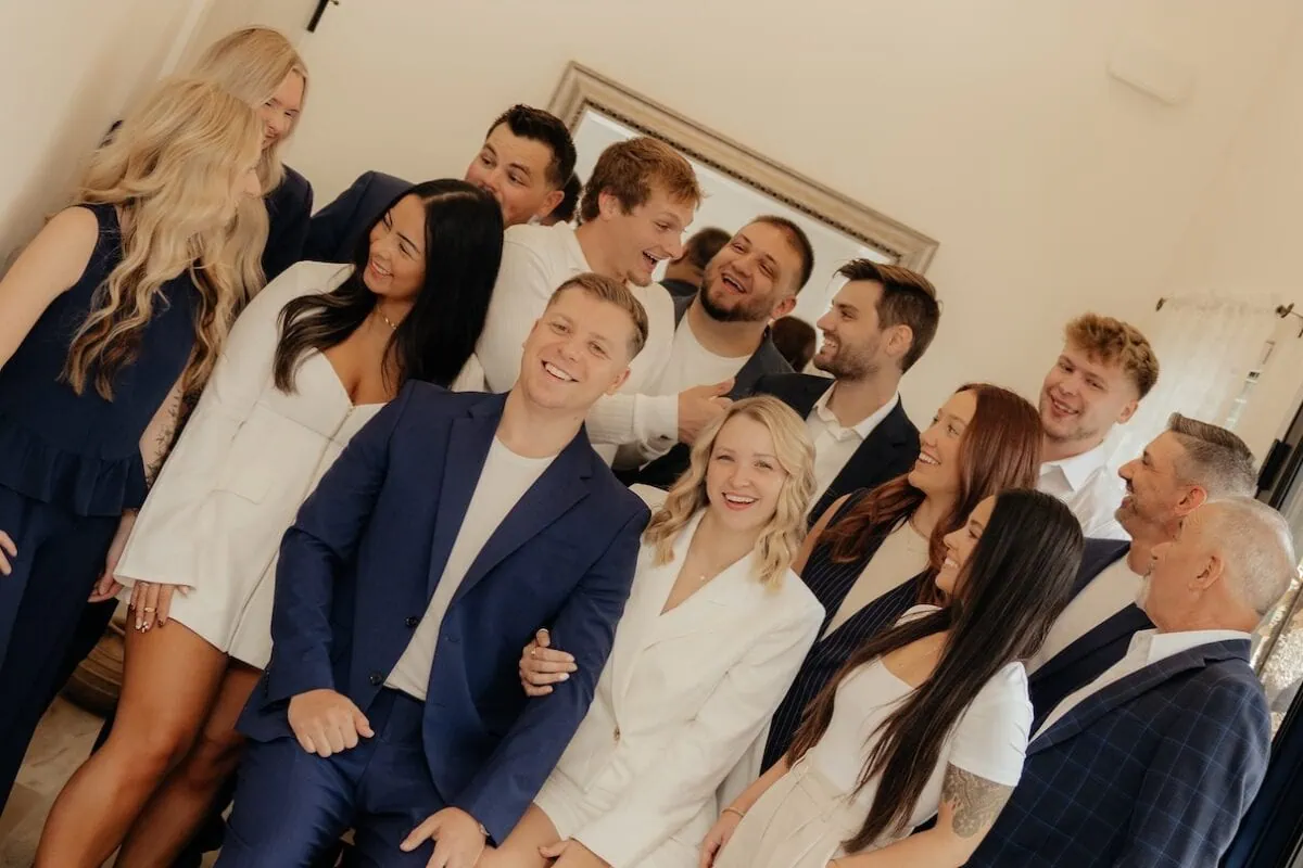 Fell Realty Agents group photo of everyone smiling and laughing
